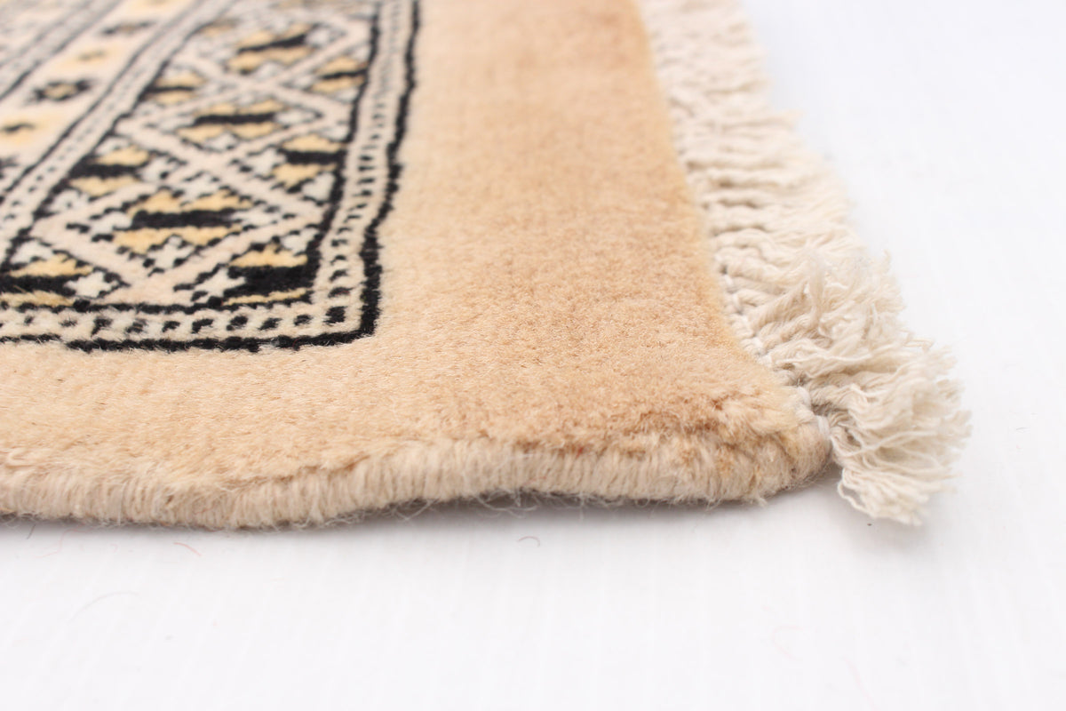 Peshawar Bokhara rug, corner detail