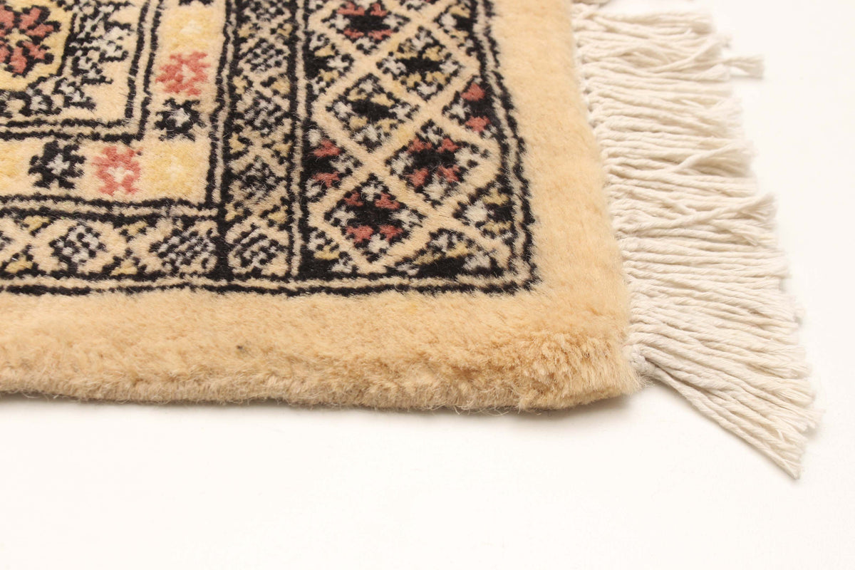 Peshawar Bokhara rug, corner detail